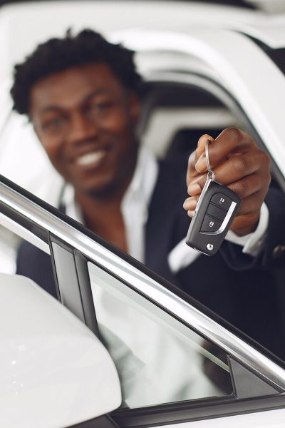 handsome-elegant-man-car-salon_1157-30188